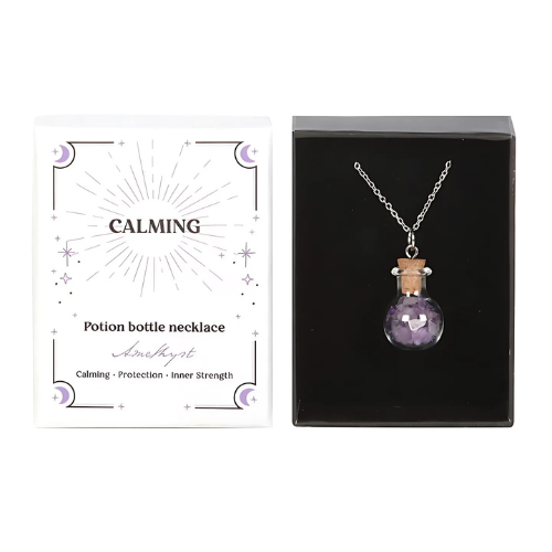 A Amethyst crystal chip bottle necklace in a mystical gift box, offering calming energy, protection, and emotional balance