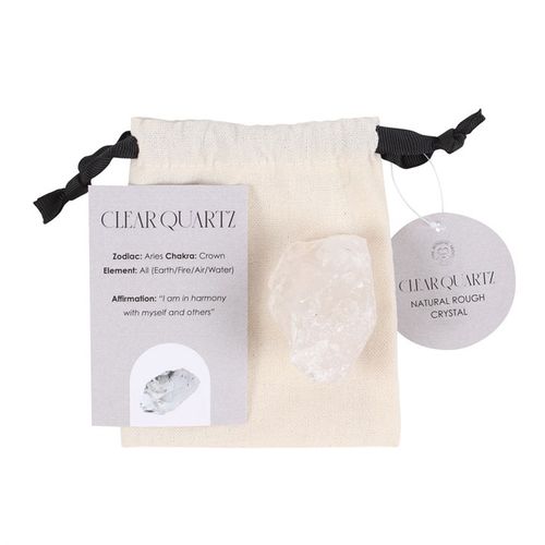 A raw Clear Quartz Rough Crystal presented in a drawstring pouch with an informational card. Known as the Master Healer, this sacred stone purifies energy, enhances intuition, and aligns the Crown Chakra, making it a powerful tool for meditation, manifestation, and self-discovery.
