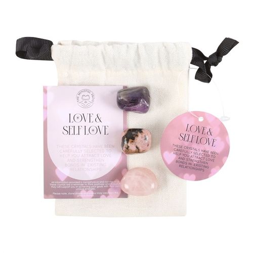 A Love & Self-Love Healing Crystal Set featuring Rose Quartz, Amethyst, and Rhodonite, beautifully arranged with a soft drawstring pouch. Includes an affirmation card and a round love-themed tag, designed to promote self-love, emotional healing, and strengthen relationships. A perfect spiritual gift for manifestation and positive energy.