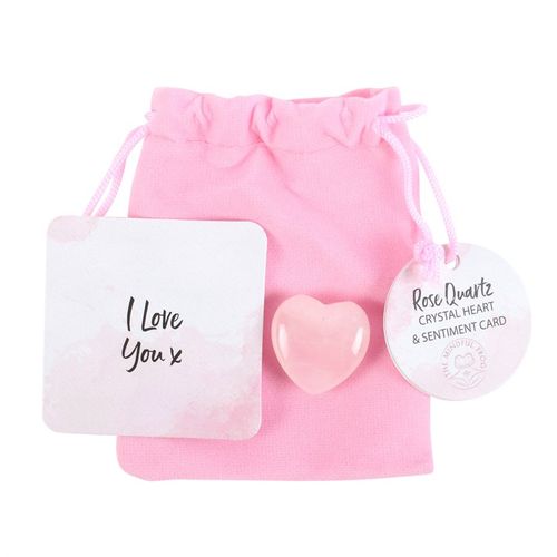 A polished Rose Quartz Crystal Heart presented with a pink drawstring pouch and a sentiment card reading "I Love You x." This healing crystal promotes self-love, emotional balance, and heart chakra healing, making it a meaningful gift for relationships, mindfulness, and spiritual well-being.
