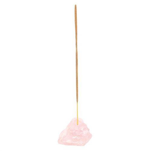 A raw Rose Quartz Crystal Incense Holder with a single incense stick. Designed to promote self-love, emotional healing, and heart chakra balance while enhancing meditation, relaxation, and mindfulness practices.