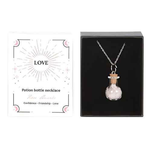 A Rose Quartz crystal chip bottle necklace in a celestial-themed gift box, representing love, confidence, and emotional healing.